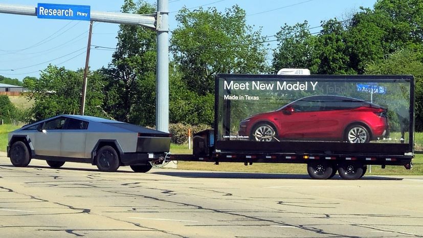 Tesla Cybertruck towing Model Y